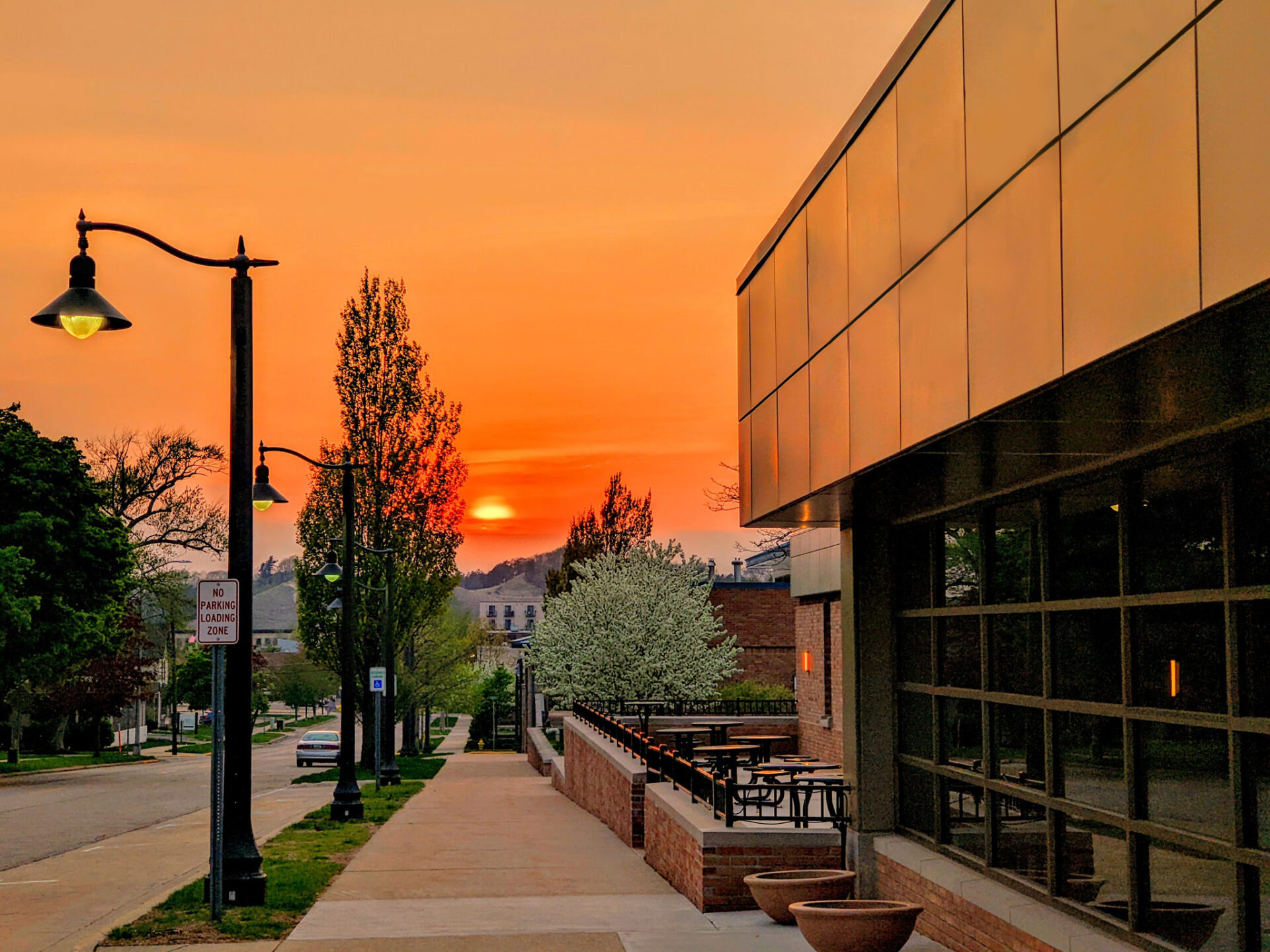 Central Park Places' exterior with a sunset in the background